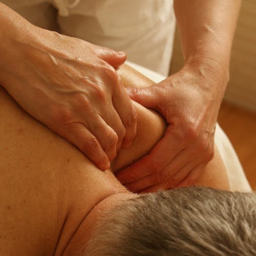 A man enjoying a relaxing bodywork massage at Giordano Acupuncture